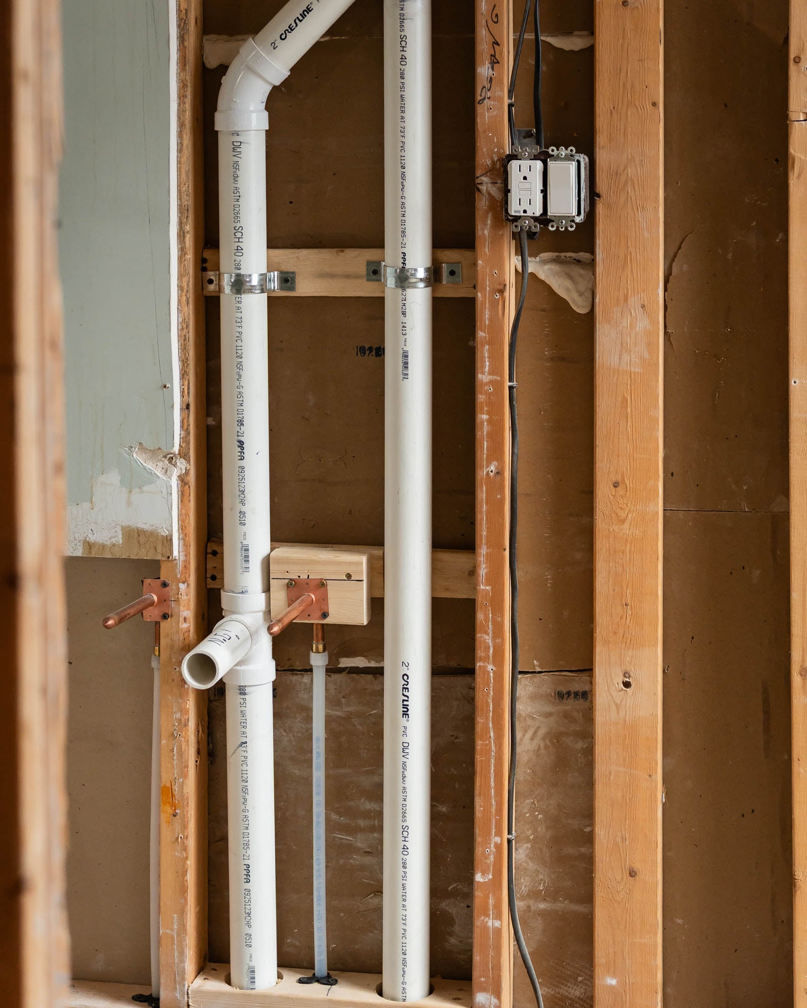 PVC drain rough-in - bathroom renovation plumbing