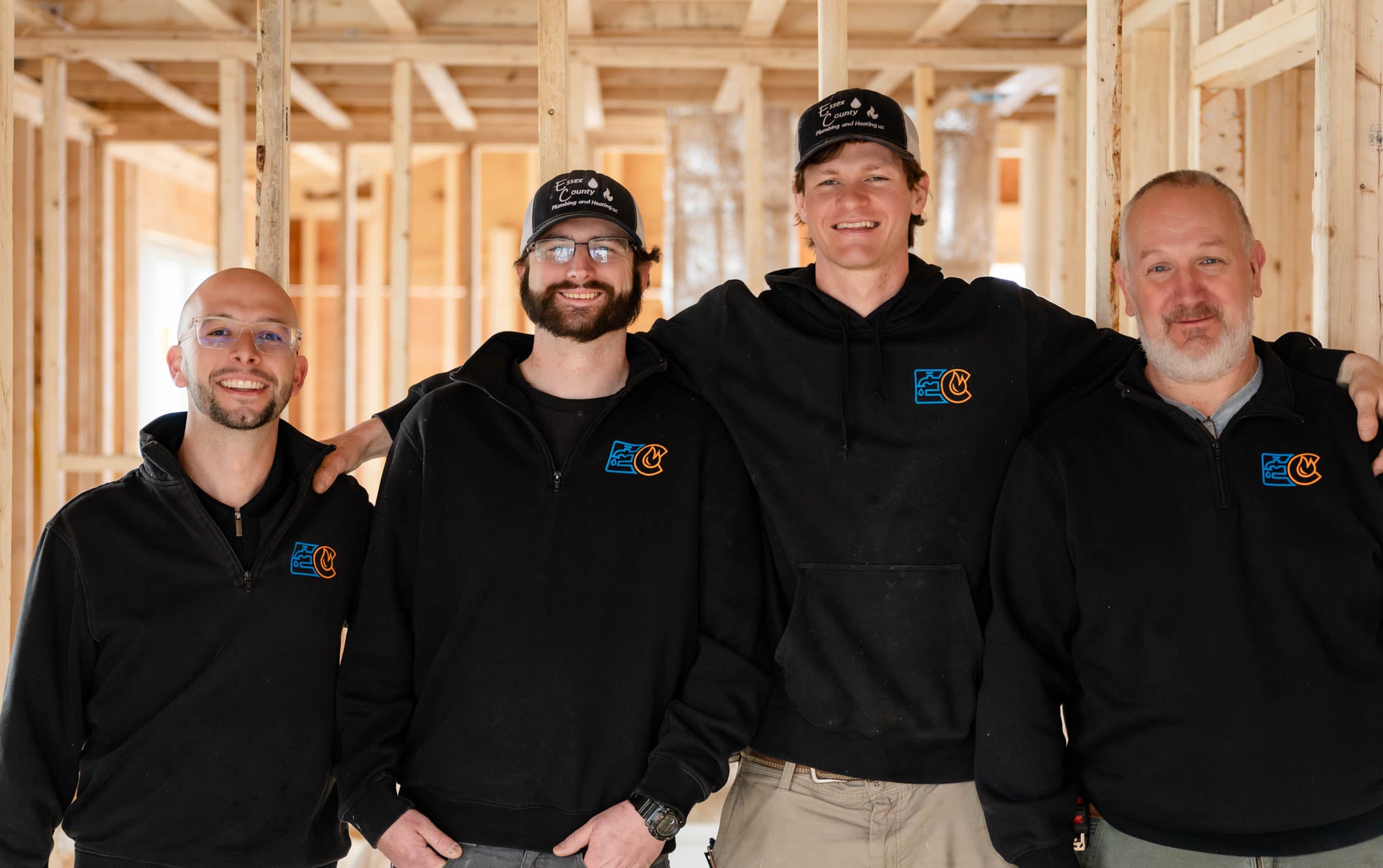 Full team group shot - ECPH owner-led plumbing crew