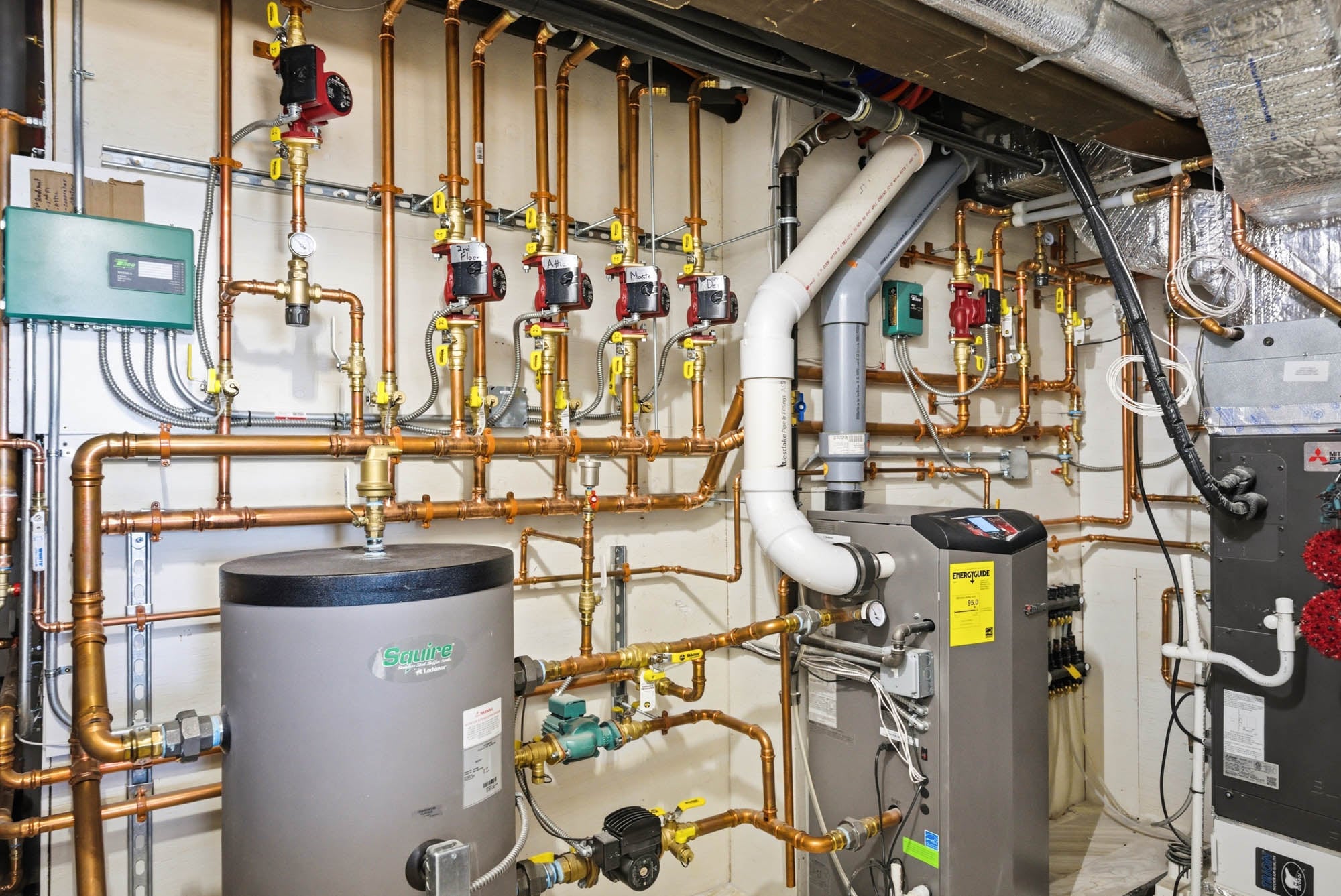 Full mechanical room — boiler, indirect water heater, copper piping, circulator pumps - Essex County MA