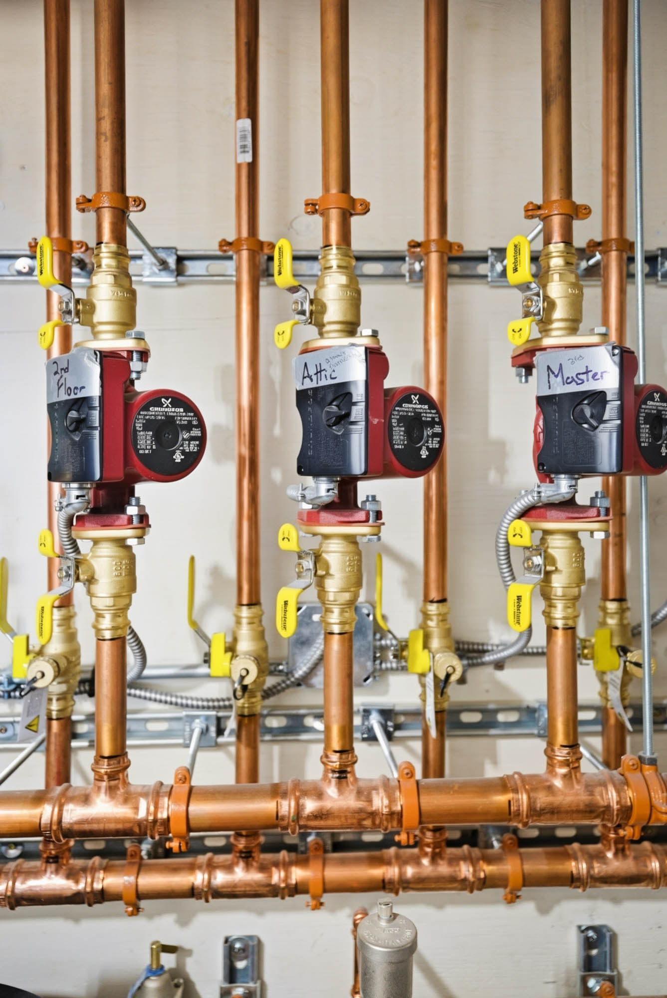 Labeled hydronic zone circulator pumps — First Floor / Attic / Master - hydronic heating